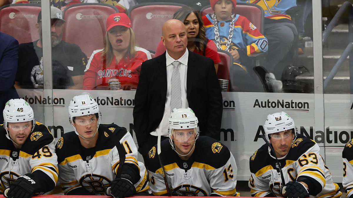 Boston Bruins head coach Jim Montgomery looks on from the bench against the Florida Panthers during the third period at Amerant Bank Arena.