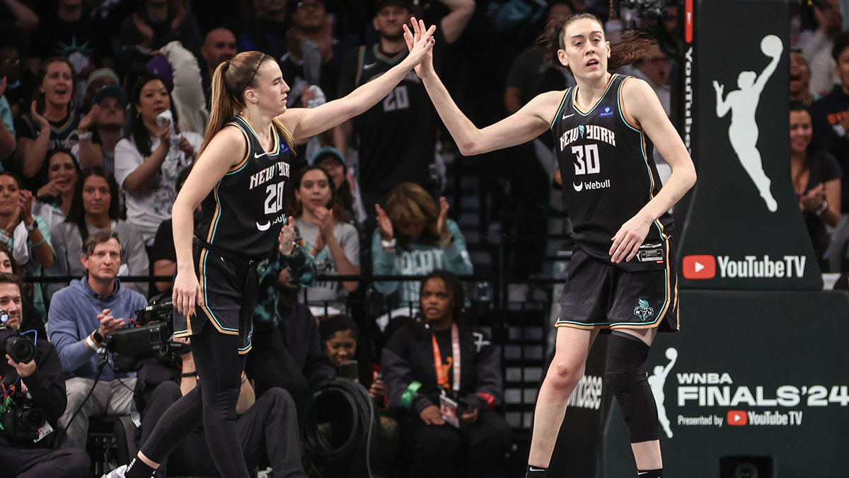 New York Liberty guard Sabrina Ionescu (20) and forward Breanna Stewart (30) during game five of the 2024 NBA Finals at Barclays Center.