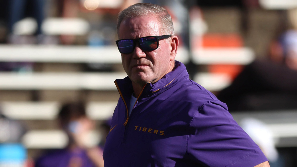 LSU Tigers head coach Brian Kelly looks on prior to the game against the Florida Gators at Ben Hill Griffin Stadium.