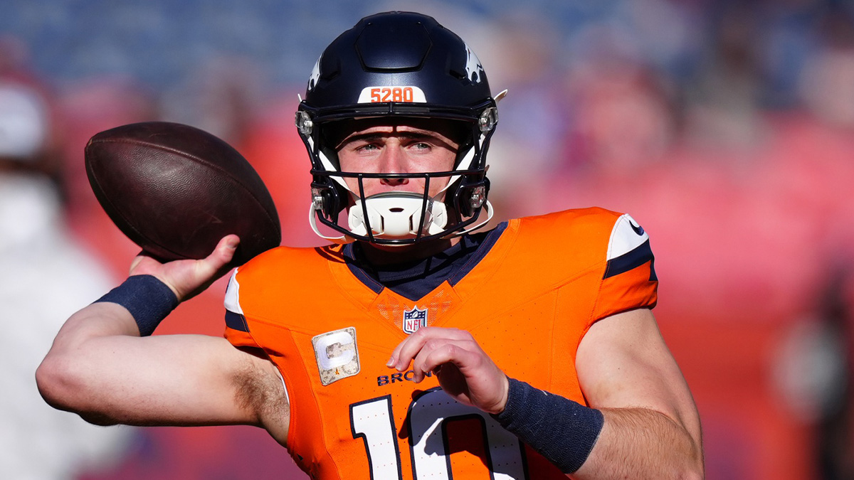 Denver Broncos quarterback Bo Nix (10) warms before the game against the Atlanta Falcons at Empower Field at Mile High.