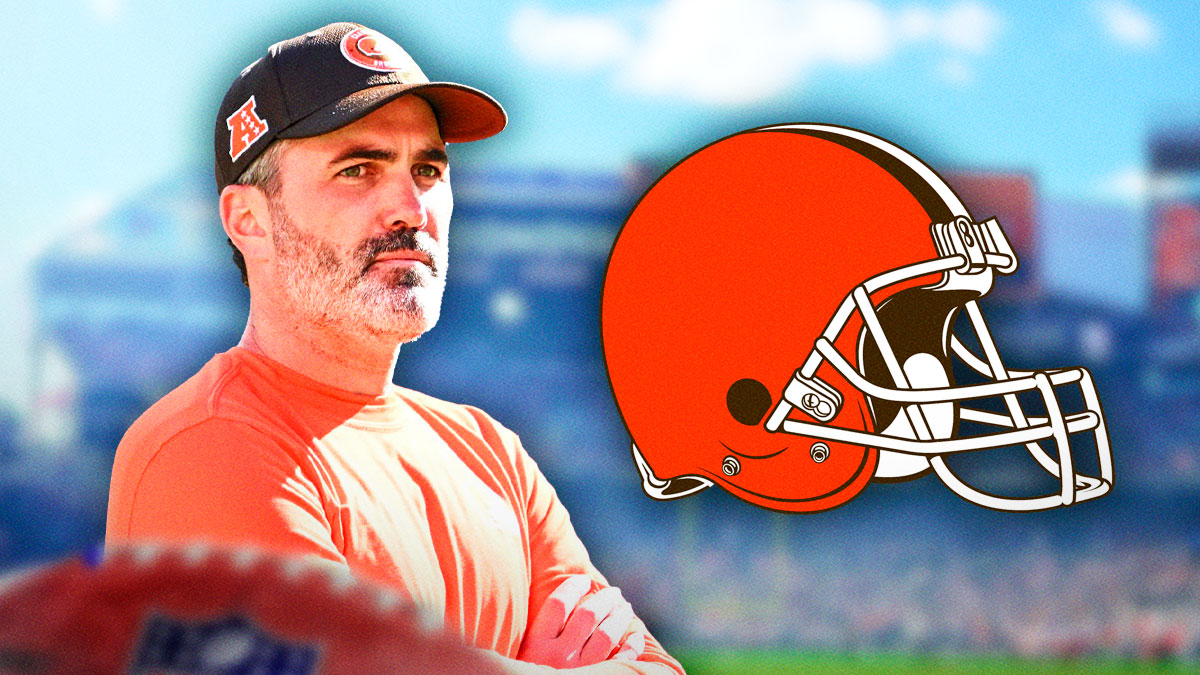 Kevin Stefanski next to a Browns logo