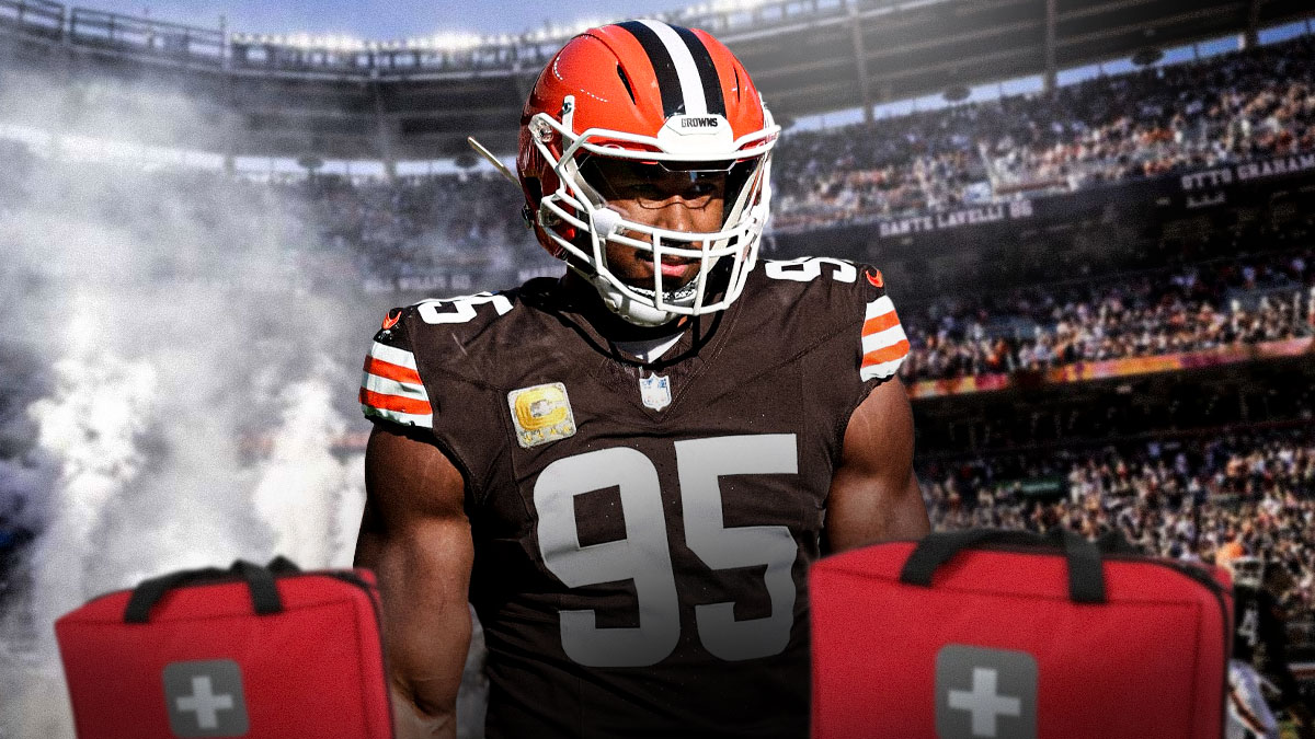 Myles Garrett in Browns uniform with medical symbol.