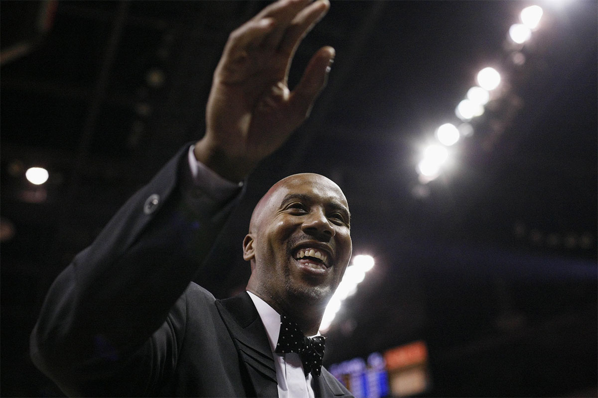 San Antonio Spurs former players Bruce Boven waves fans during the first half against Minnesota Timbervolves at the AT & T Center.