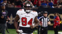 Tampa Bay Buccaneers defensive tackle Calijah Kancey (94) run on the field against the New Orleans Saints during the first half at Caesars Superdome.