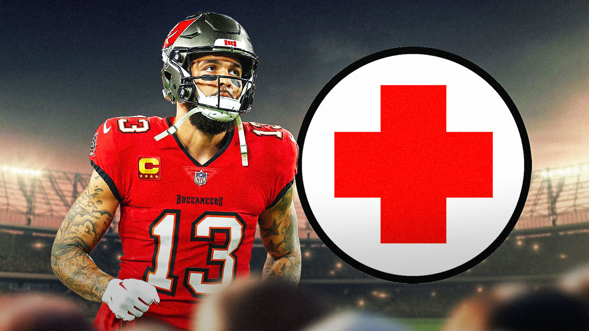 Mike Evans in a Tampa Bay Buccaneers uniform with a red and white first aid symbol as Evans could return from injury to play the giants in week 12.