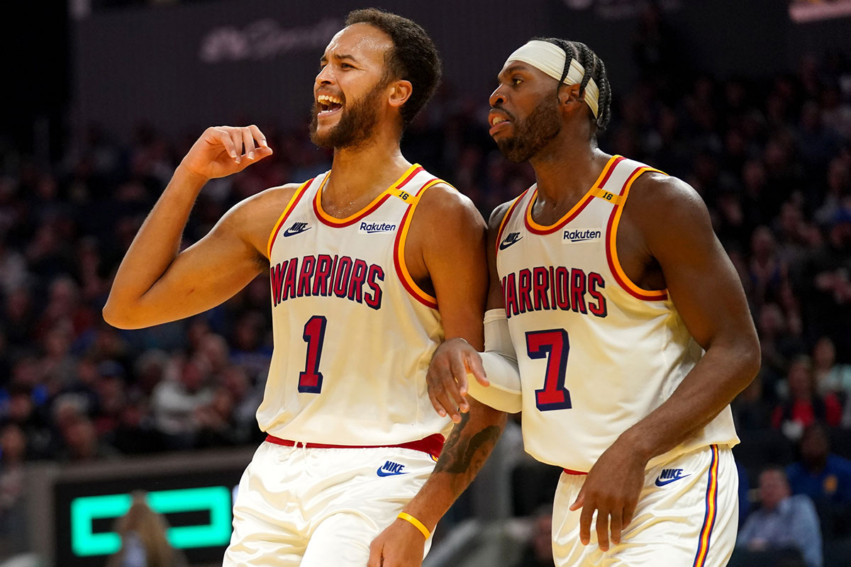 Golden State Warriors forward Kyle Anderson (1) reacts next to guard Buddy Hield (7) after being fouled against the New Orleans Pelicans in the second quarter at the Chase Center.