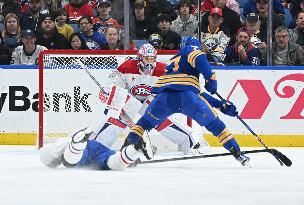 Montreal Canadiens goaltender Cayden Primeau (30) looks to block a shot by Buffalo Sabres right wing JJ Peterka (77) in the third period at KeyBank Center.