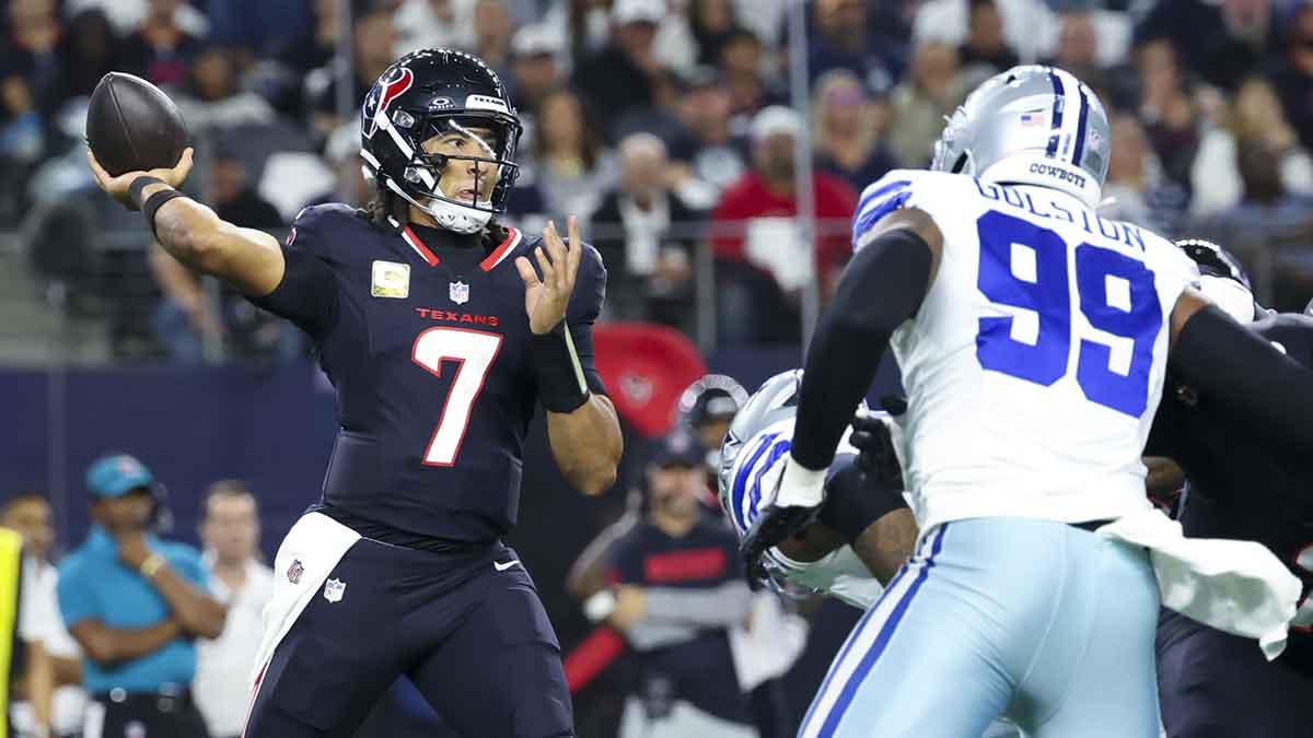 Houston Texans quarterback C.J. Stroud (7) throws during the first quarter against the Dallas Cowboys at AT&T Stadium.