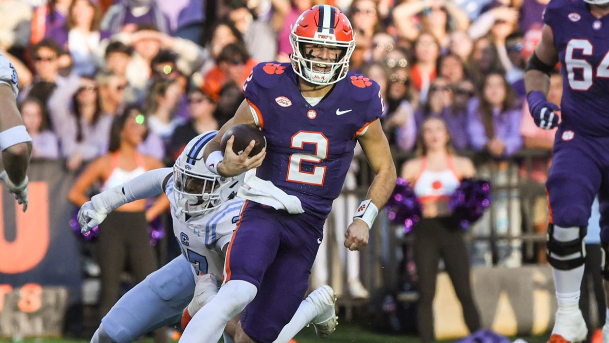 Clemson Tigers quarterback Cade Klubnik (2) runs for a first down against The Citadel Bulldogs during the second quarter at Memorial Stadium.