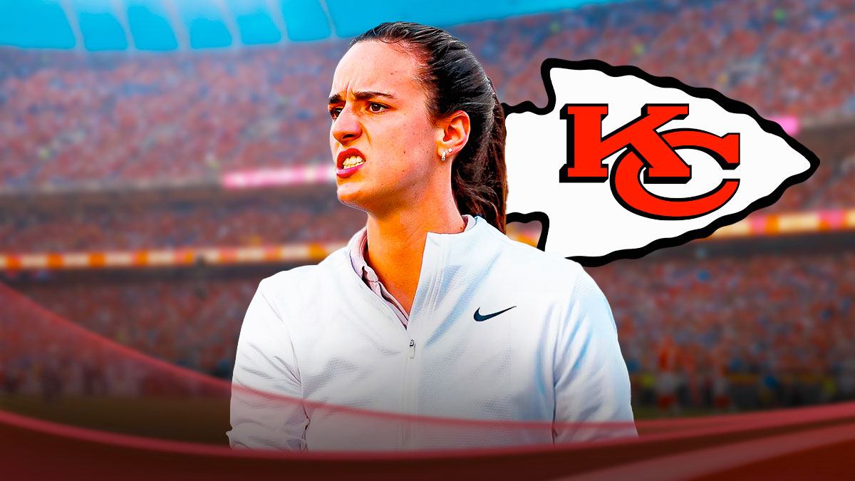 Caitlin Clark in street clothes smiling next to a Chiefs logo