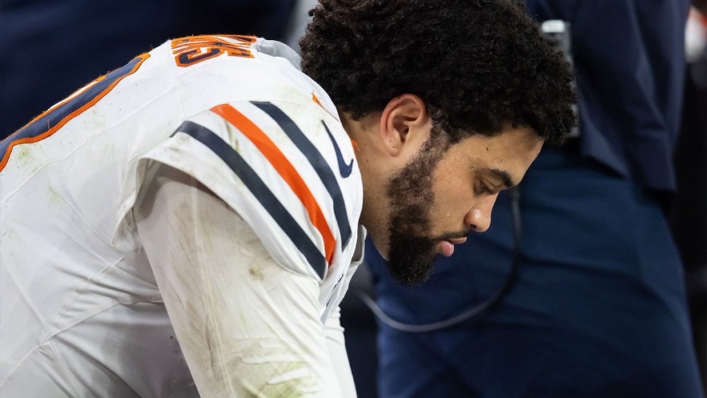 Chicago Bears quarterback Caleb Williams (18) reacts on the bench against the Arizona Cardinals at State Farm Stadium.