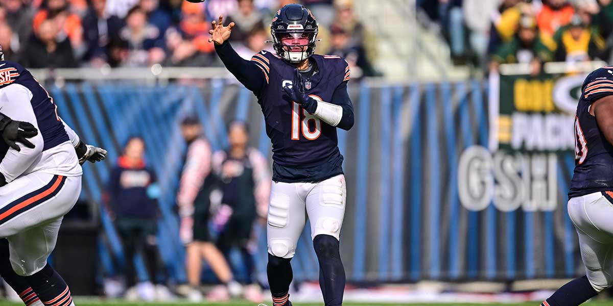Chicago Bears quarterback Caleb Williams (18) passes the ball against the Green Bay Packers during the second quarter at Soldier Field.