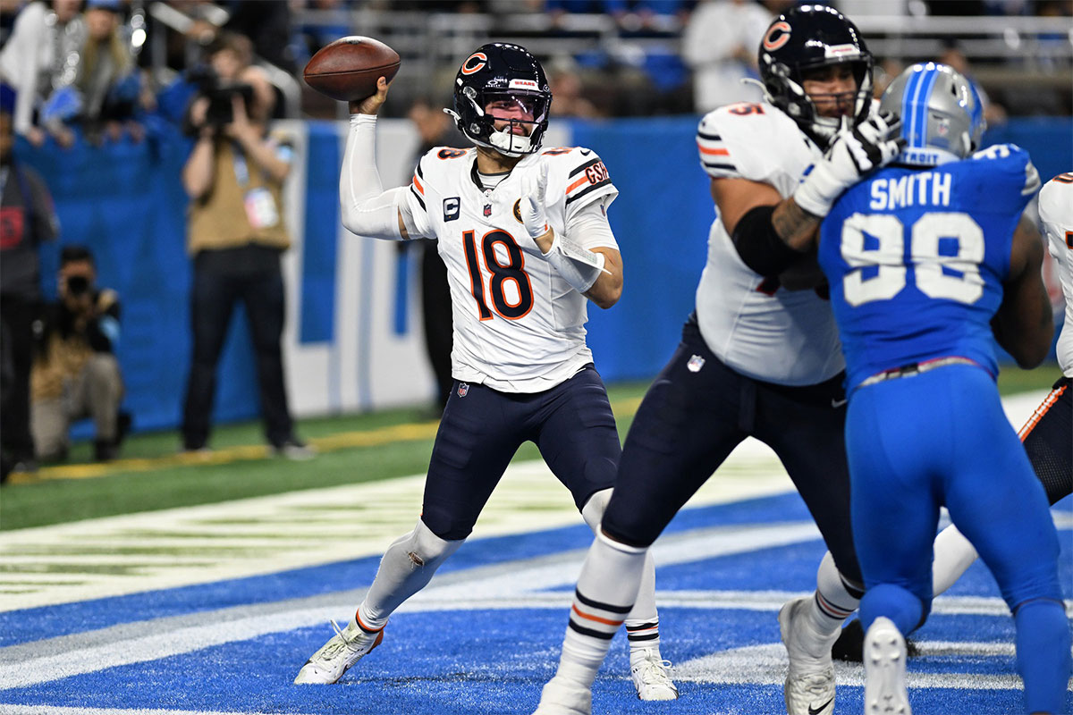 Chicago Bears quarterback Caleb Williams (18) throws a pass out of his own end zone against the Detroit Lions in the fourth quarter at Ford Field.