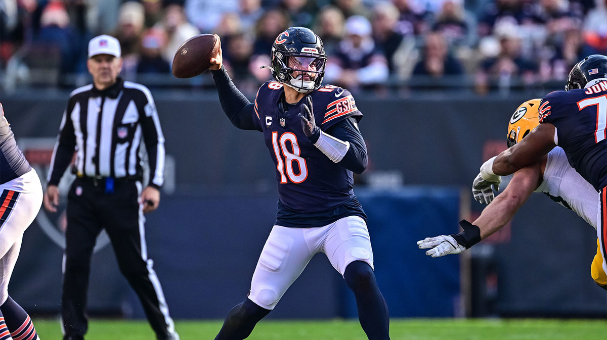 Nov 17, 2024; Chicago, Illinois, USA; Chicago Bears quarterback Caleb Williams (18) passes the ball against the Green Bay Packers during the third quarter at Soldier Field.