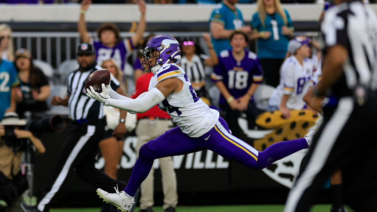 Minnesota Vikings safety Camryn Bynum (24) catches an interception to effectively end the game during the fourth quarter of an NFL football matchup Sunday, Nov. 10, 2024 at Everbank Stadium in Jacksonville, Fla. The Vikings defeated the Jaguars 12-7. 