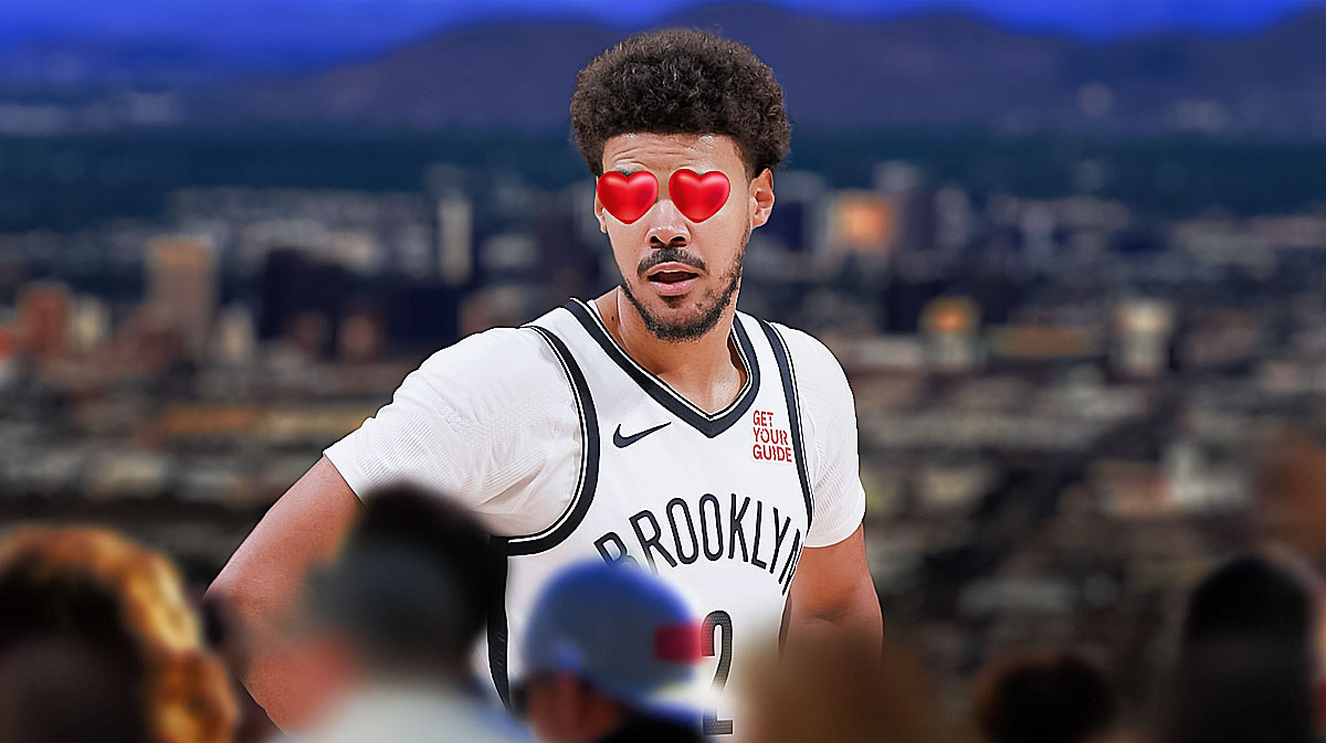 Nets forward Cam Johnson with hearts on his eyes and a background of Downtown Phoenix