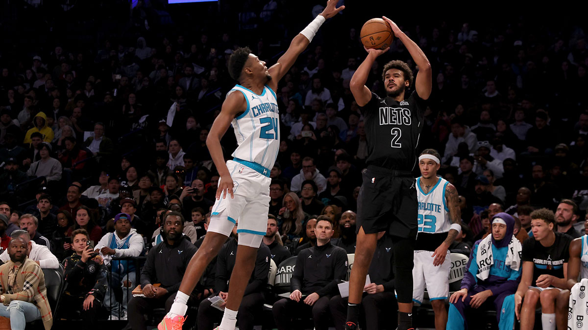 Brooklyn Nets forward Cameron Johnson (2) takes a three point shot against Charlotte Hornets forward Brandon Miller (24) during the fourth quarter at Barclays Center.