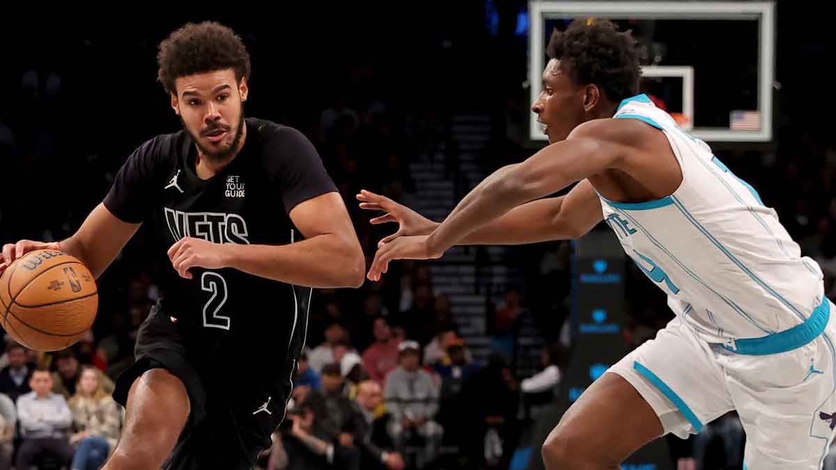 Brooklyn Nets forward Cameron Johnson (2) drives to the basket against Charlotte Hornets forward Moussa Diabate (14) during the fourth quarter at Barclays Center.