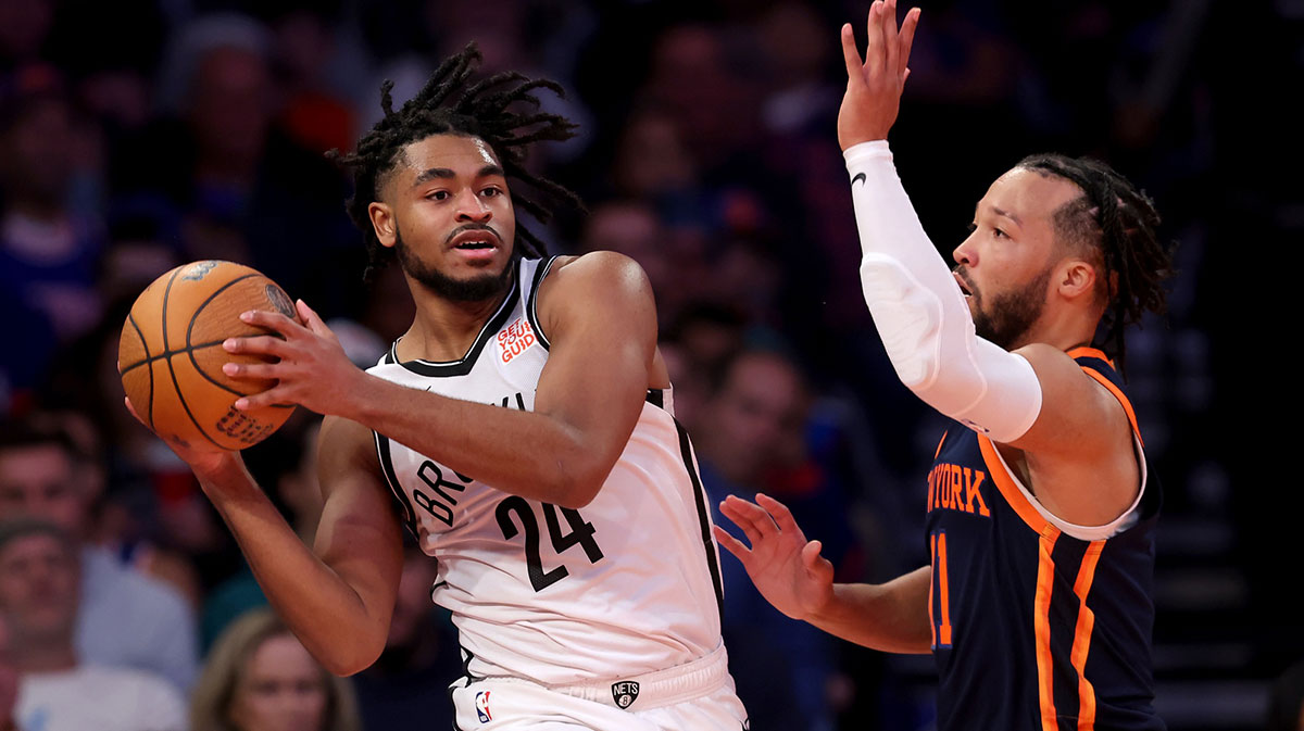 Brooklyn Nets guard Cam Thomas (24) looks to pass the ball against New York Knicks guard Jalen Brunson (11) during the third quarter at Madison Square Garden.