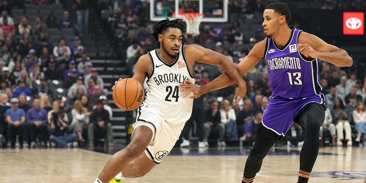 Brooklyn Nets guard Cam Thomas (24) dribbles against Sacramento Kings forward Keegan Murray (13) during the first quarter at Golden 1 Center.