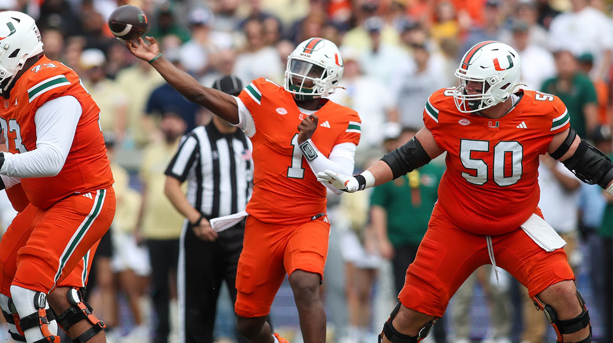 Miami Hurricanes quarterback Cam Ward (1) throws a pass against the Georgia Tech Yellow Jackets in the second quarter at Bobby Dodd Stadium at Hyundai Field.