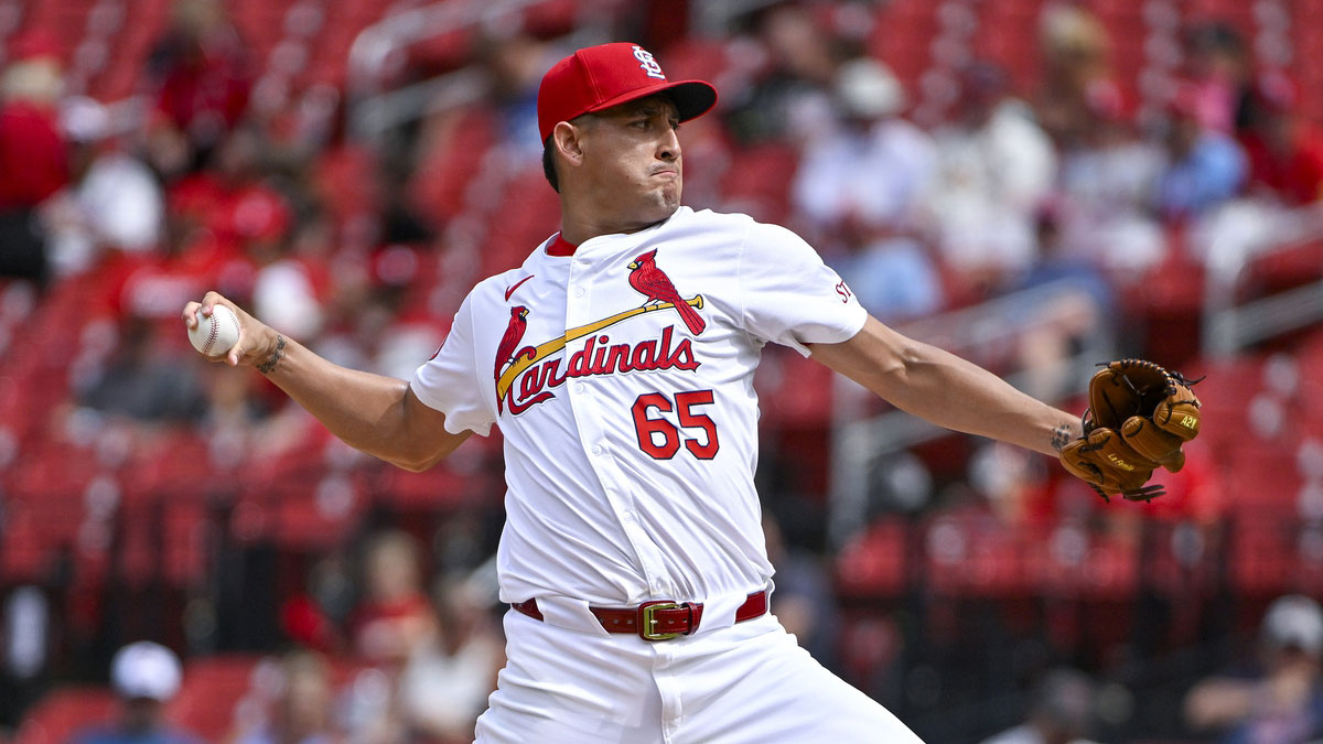 St. Louis Cardinals relief pitcher Giovanny Gallegos (65) pitches against the Atlanta Braves during the eighth inning at Busch Stadium