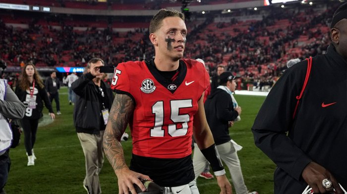 Transfer portal Georgia quarterback Carson Beck (15) leaves the field after winning a NCAA college football game against Tennessee in Athens, Ga., on Saturday, Nov. 16, 2024.