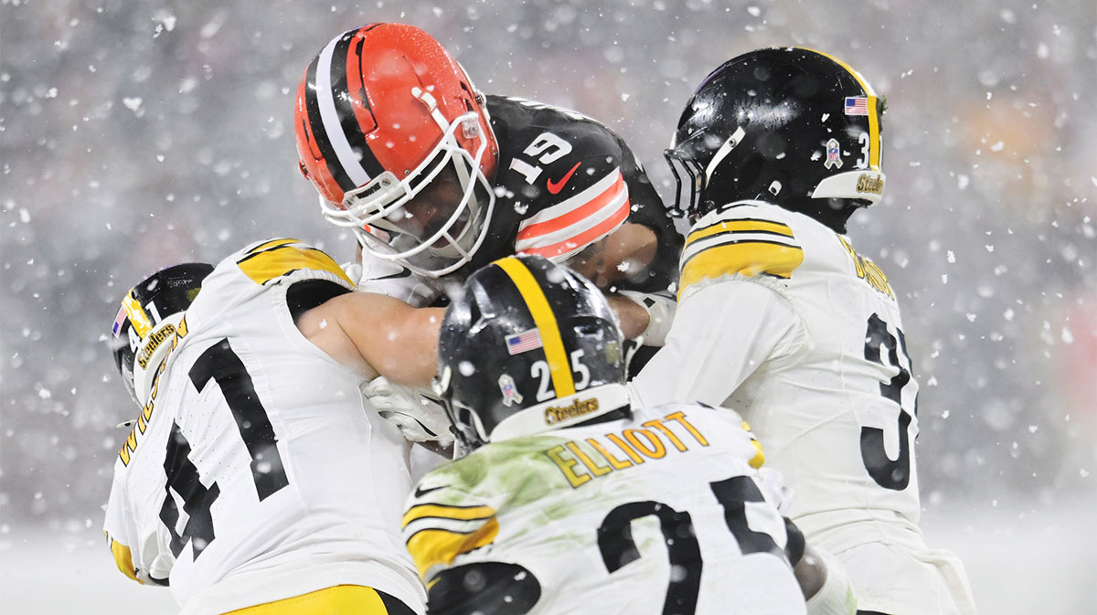 Nov 21, 2024; Cleveland, Ohio, USA; Cleveland Browns wide receiver Cedric Tillman (19) is tackled by Pittsburgh Steelers linebacker Payton Wilson (41) and safety DeShon Elliott (25) and cornerback Beanie Bishop Jr. (31) during the second half at Huntington Bank Field.