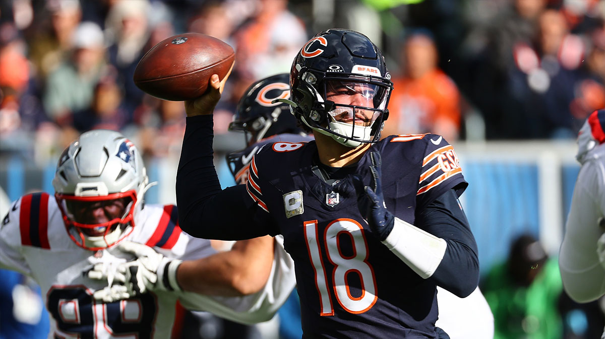 Chicago Bears quarterback Caleb Williams (18) drops back to pass against the New England Patriots during the second half at Soldier Field.
