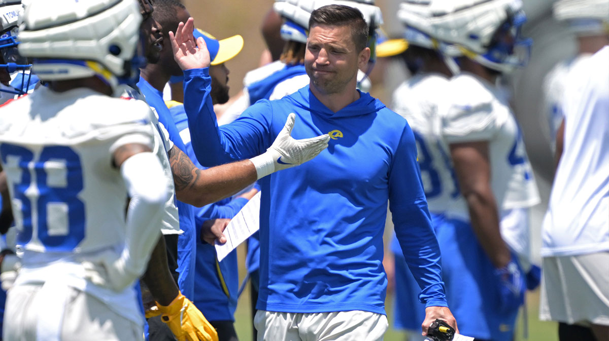 Los Angeles Rams defensive coordinator Chris Shula talks with players during OTAs at the team training facility at California Lutheran University.