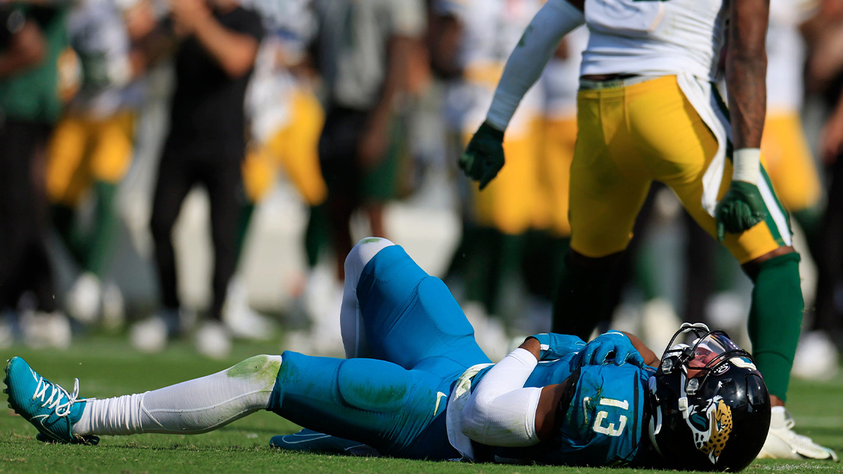 Jacksonville Jaguars wide receiver Christian Kirk (13) lies on the turf after an apparent injury during the fourth quarter of an NFL football game on Sunday, October 27, 2024, at Everbank Stadium in Jacksonville, Florida. The Packers beat the Jaguars 30-27. last second field goal.