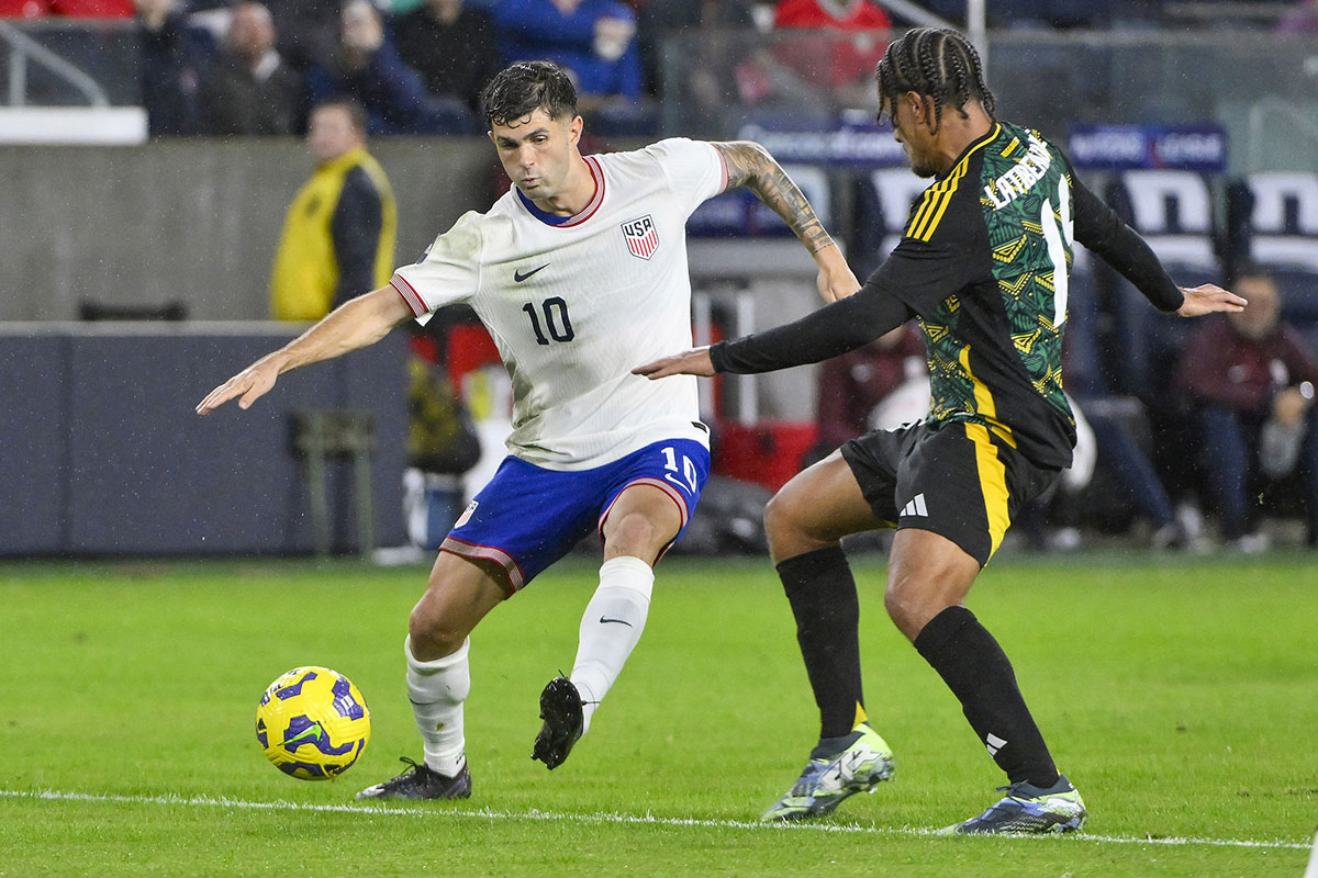 United States forward Christian Pulisic (10) controls the ball as Jamaica midfielder Joel Latibeaudiere (15) defends during the second half at CITYPark. 