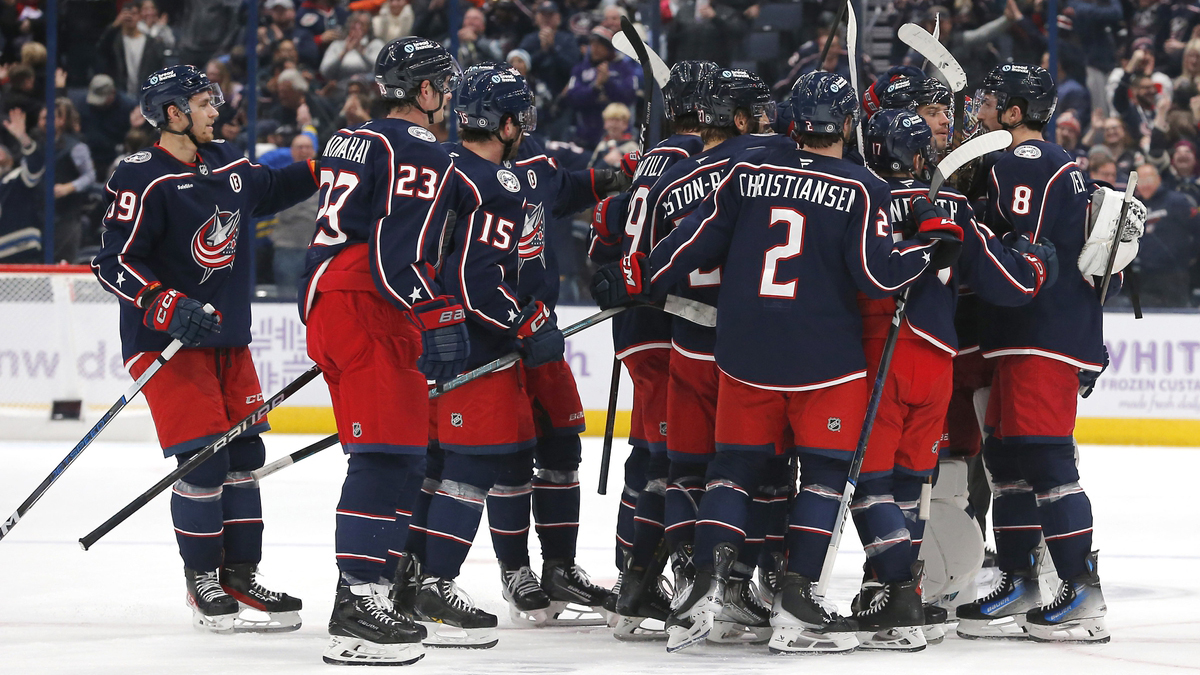 Columbus Blue Jackets defenseman Zach Werenski (8) celebrates his game winning goal in overtime against the Tampa Bay Lightning at Nationwide Arena.