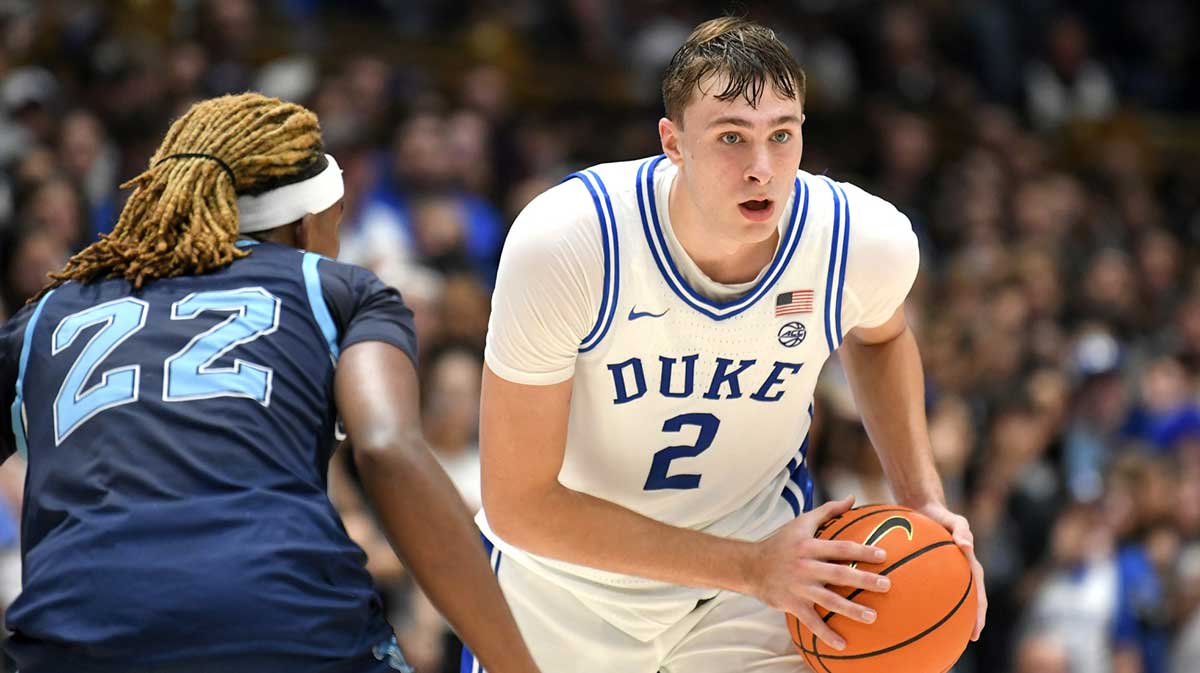 Duke Blue Devils guard Cooper Flagg (2) looks for an opening to pass during the second half against the Maine Black Bears at Cameron Indoor Stadium.