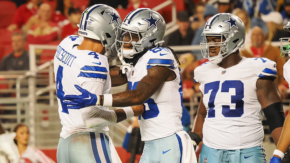 Dallas Cowboys quarterback Dak Prescott (4) celebrates with wide receiver CeeDee Lamb (88) after a touchdown against the San Francisco 49ers during the fourth quarter at Levi's Stadium.