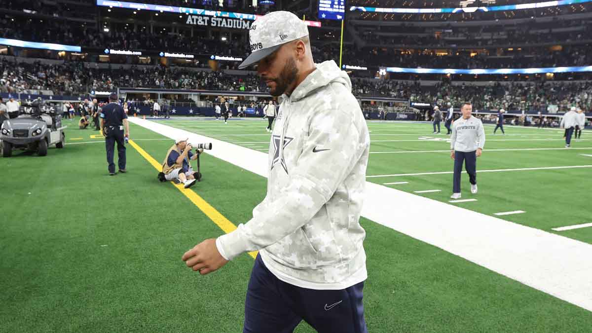 Dallas Cowboys quarterback Dak Prescott (4) walks off the field after the game against the Philadelphia Eagles at AT&T Stadium.