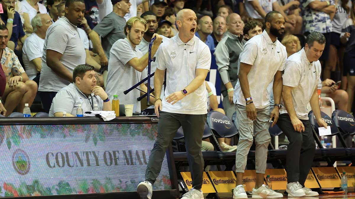 Connecticut Huskies head coach Dan Hurley reacts to play as his team takes on the Memphis Tigers during an NCAA college basketball game at Lahaina Civic Center.