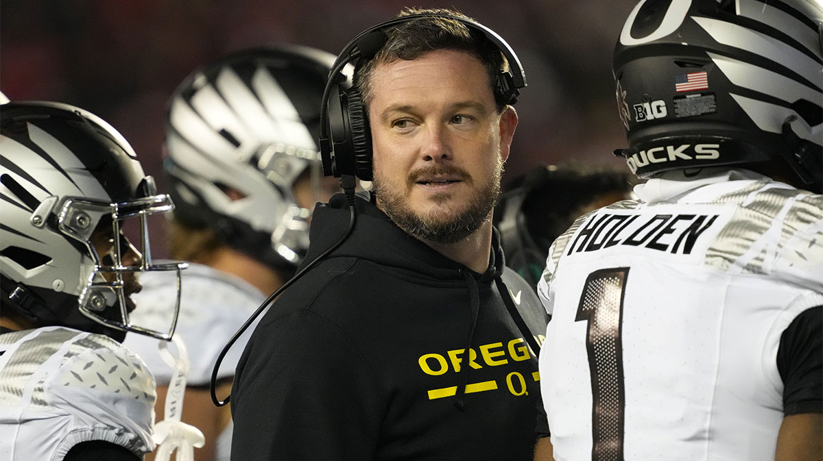 Oregon Ducks head coach Dan Lanning looks on during the third quarter against the Wisconsin Badgers at Camp Randall Stadium.