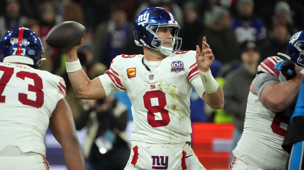 Nov 10, 2024; Munich, Germany; New York Giants quarterback Daniel Jones (8) throws the ball against the Carolina Panthers in the second half during the 2024 NFL Munich Game at Allianz Arena.