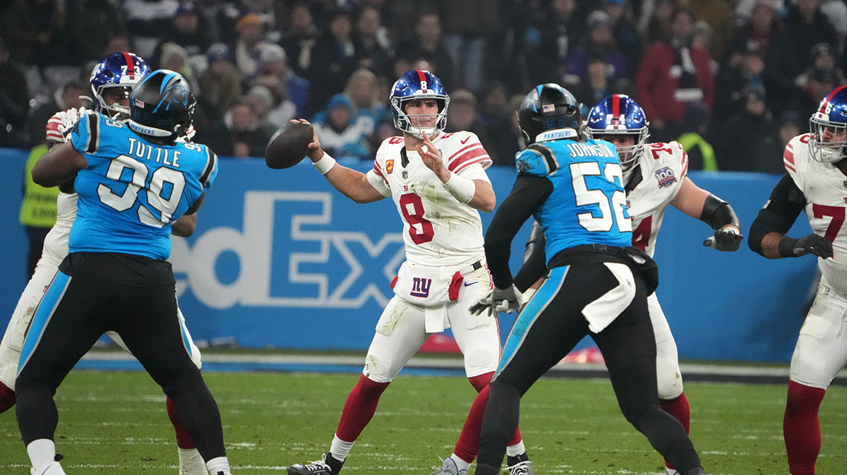 New York Giants quarterback Daniel Jones (8) throws the ball against the Carolina Panthers in the second half during the 2024 NFL Munich Game at Allianz Arena.