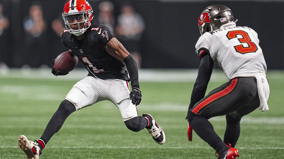 Atlanta Falcons wide receiver Darnell Mooney (1) runs against Tampa Bay Buccaneers safety Jordan Whitehead (3) after a catch at Mercedes-Benz Stadium. 