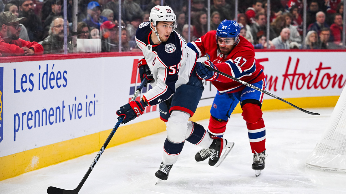Columbus Blue Jackets defenseman David Jiricek (55) plays the puck against Montreal Canadiens defenseman Jayden Struble (47) during the third period at Bell Centre.