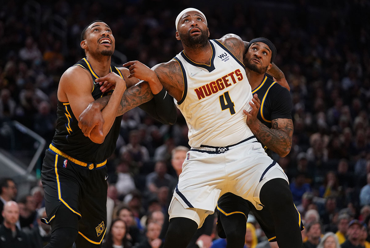 Denver Nuggets Center DeMarcus Relatives (4) Battles for a position with gold state warriors forward Otto Porter Jr. (32) I Guarse Gary Payton II (0) In the fourth quarter during the game five first rounds for the playoffs on Chase Chese Chase. .