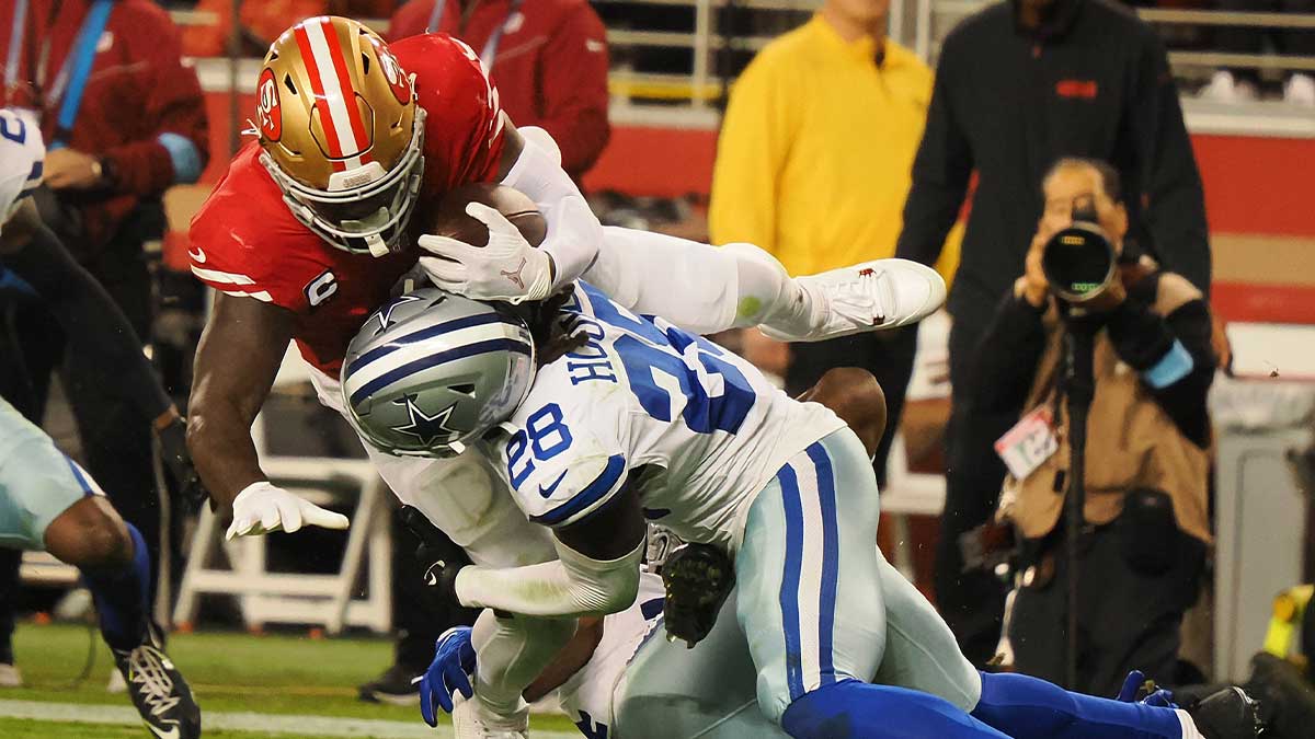 Dallas Cowboys safety Malik Hooker (28) tackles San Francisco 49ers wide receiver Deebo Samuel Sr (1) during the third quarter at Levi's Stadium