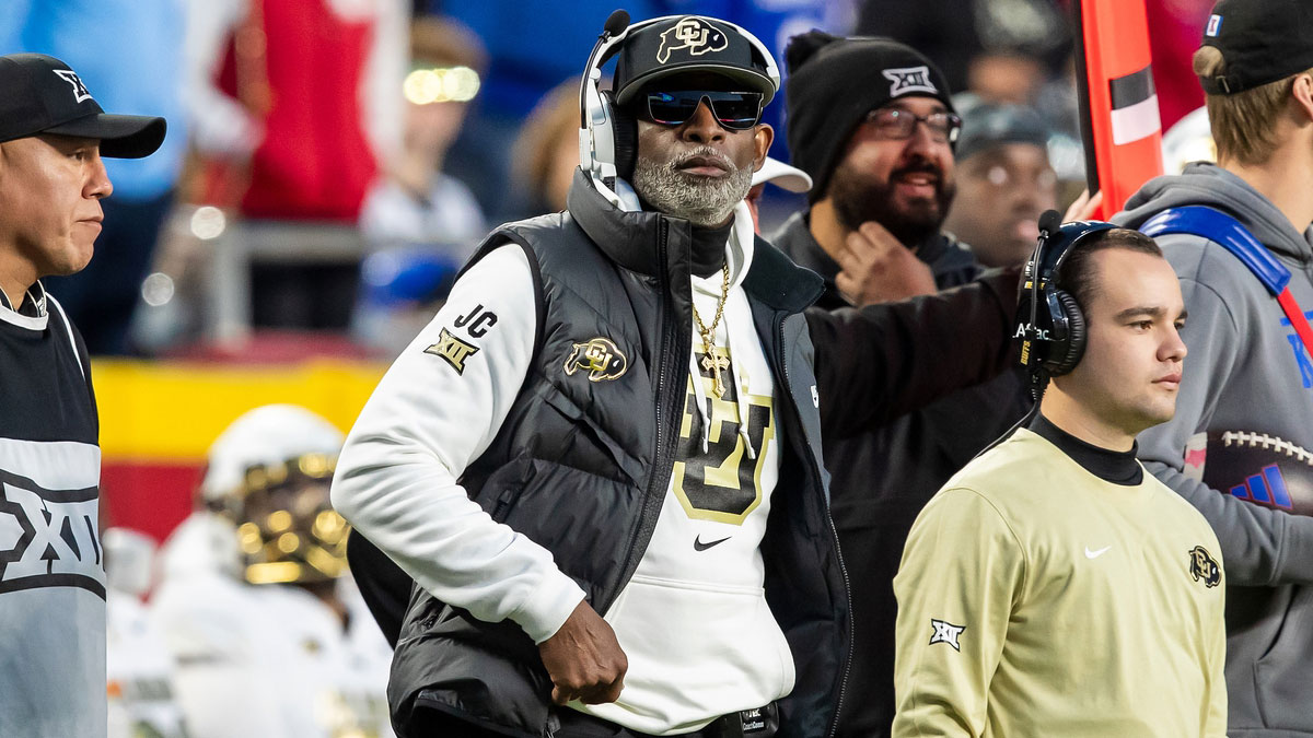 Colorado head coach Deion Sanders watches the run of play during the 3rd quarter between the Kansas Jayhawks and the Colorado Buffaloes at GEHA Field at Arrowhead Stadium.