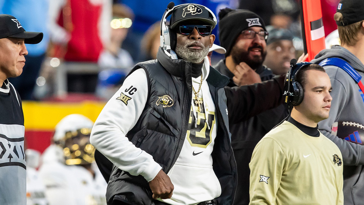 Colorado head coach Deion Sanders watches the run of play during the 3rd quarter between the Kansas Jayhawks and the Colorado Buffaloes at GEHA Field at Arrowhead Stadium