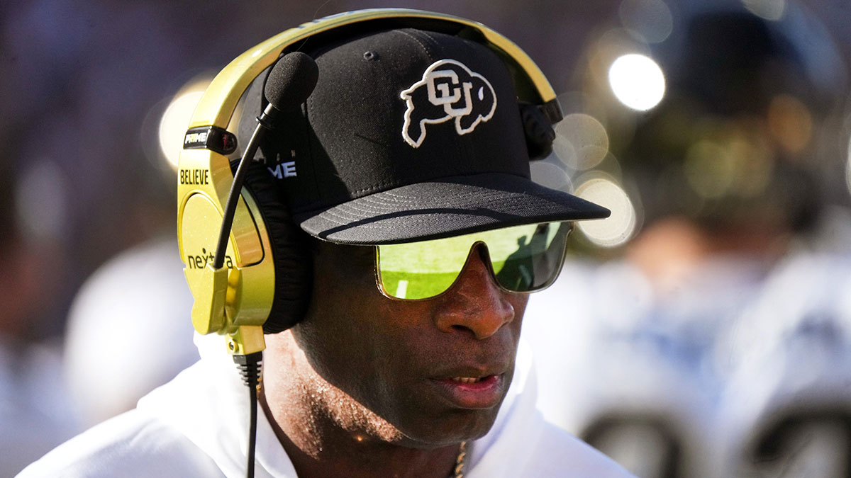 Colorado Buffaloes head coach Deion Sanders walks the sidelines as his team takes on the ASU Sun Devils at Mountain America Stadium