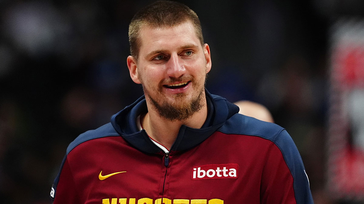 Denver Nuggets center Nikola Jokic (15) reacts before the game against the Dallas Mavericks at Ball Arena.