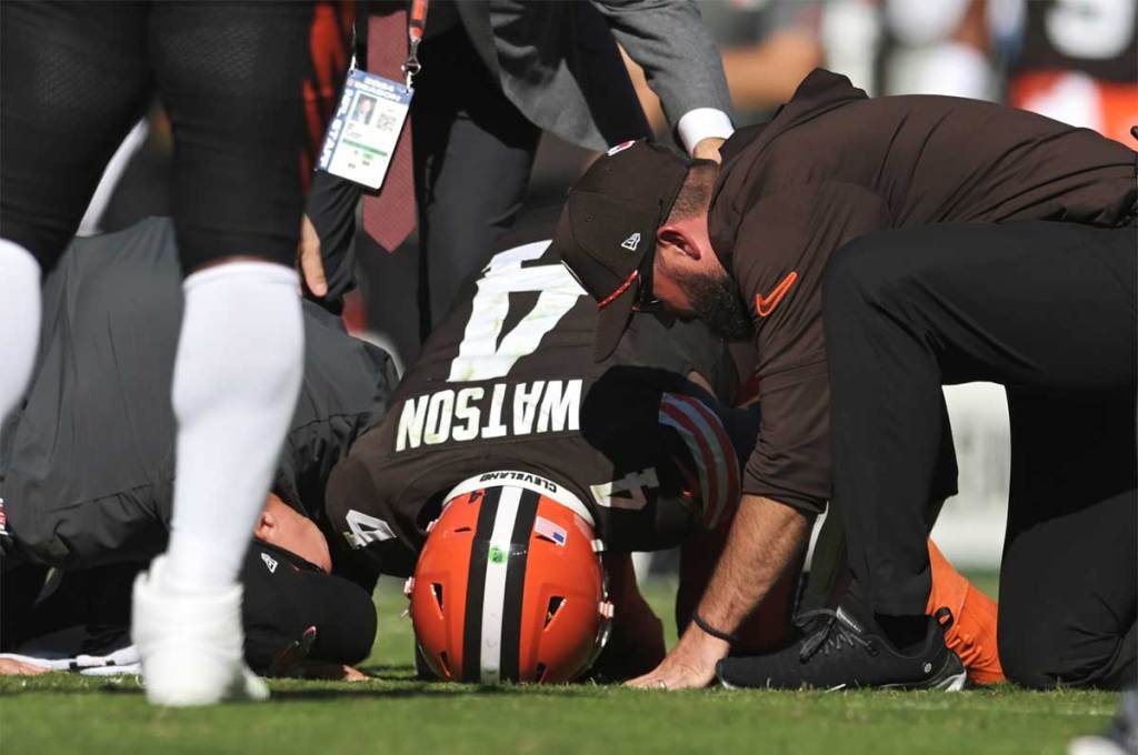 Cleveland Browns quarterback Deshaun Watson (4) lies on the ground after being injured during the first half against the Cincinnati Bengals at Huntington Bank Field. 