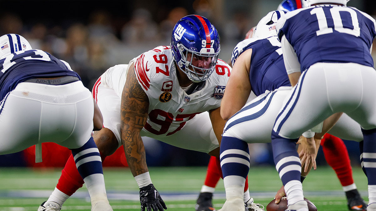 New York Giants defensive tackle Dexter Lawrence II (97) tackles the Dallas Cowboys in the first quarter at AT&T Stadium.